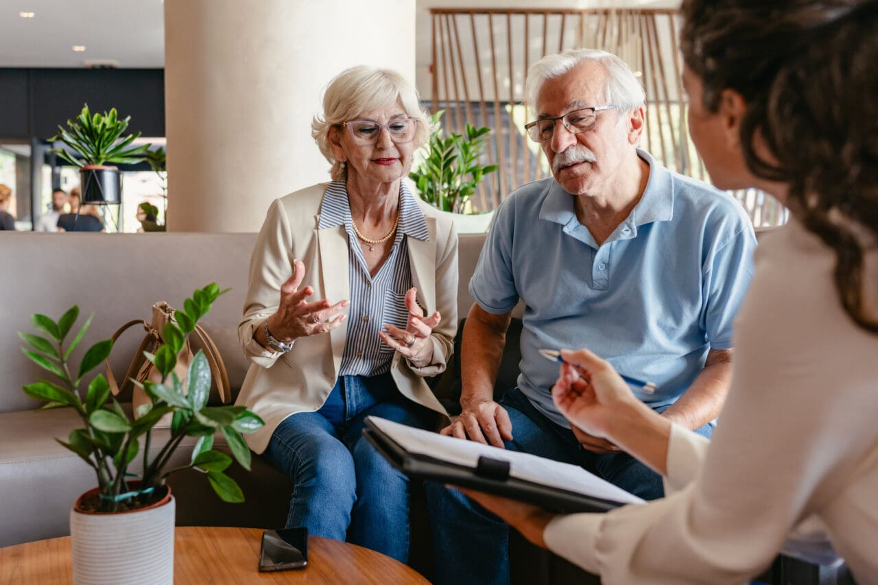 Medicare agent explaining coverage to a senior couple